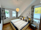 Fewo Bergzauber**** - Schlafzimmer mit TV