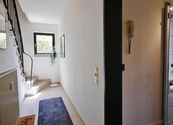 Treppenhaus und Eingang - Fewo Glücksgriff****
