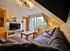 Fewo A am Kurpark - Wohnzimmer mit  Homecinema und viele DVD/Cds