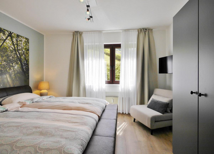Schlafzimmer mit TV - Fewo Glücksgriff****