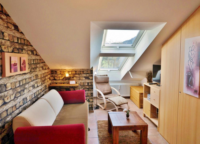Junior-Suite Wohnbereich mit TV, Dvd, Hifi und schöner Aussicht