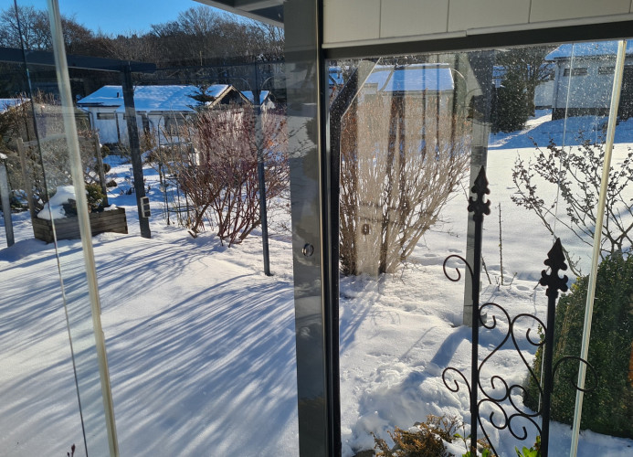 Wintergarten mit Winterblick