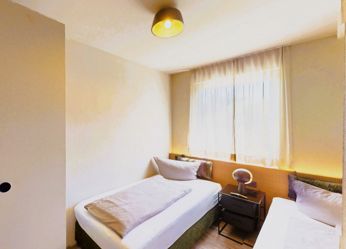 Schlafzimmer 2 mit TV - Villa Edelweiss*****