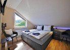 Fewo Steingrotte - Schlafzimmer 1 mit TV